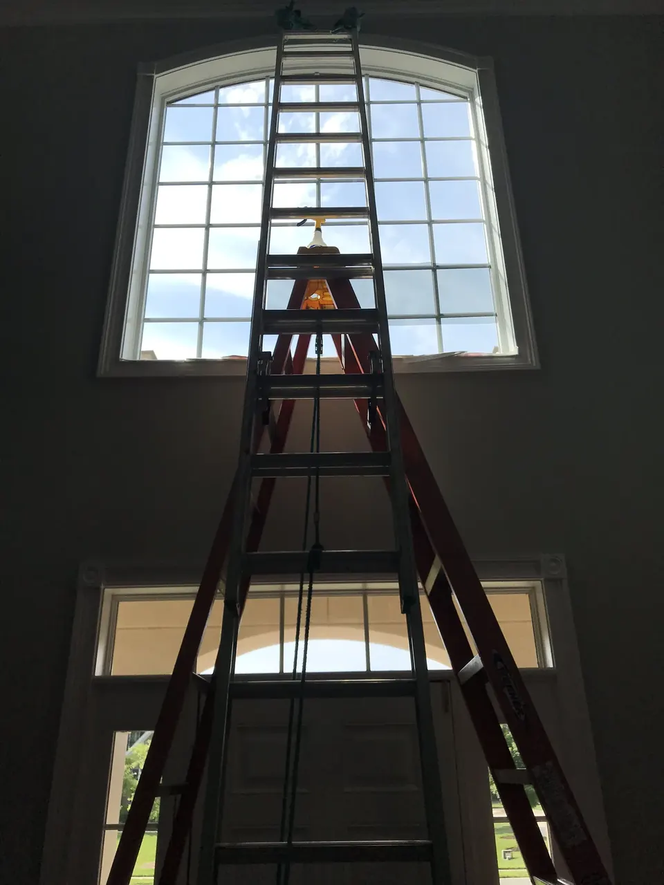 Interior window cleaning in a Charlotte home foyer