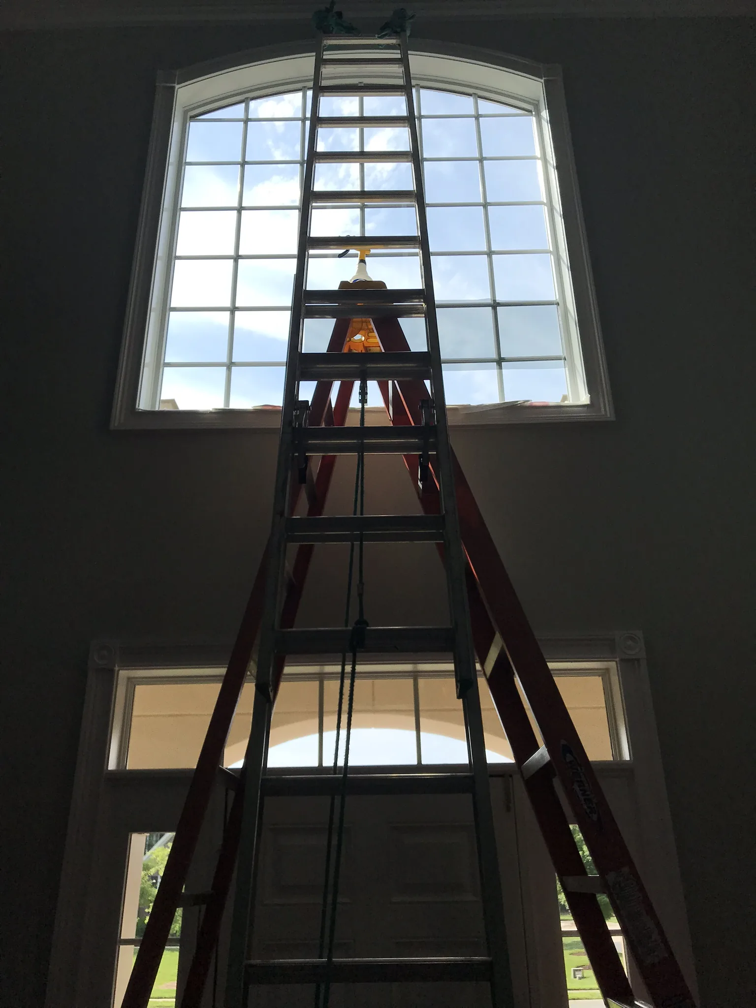 Interior window cleaning in a Charlotte home foyer