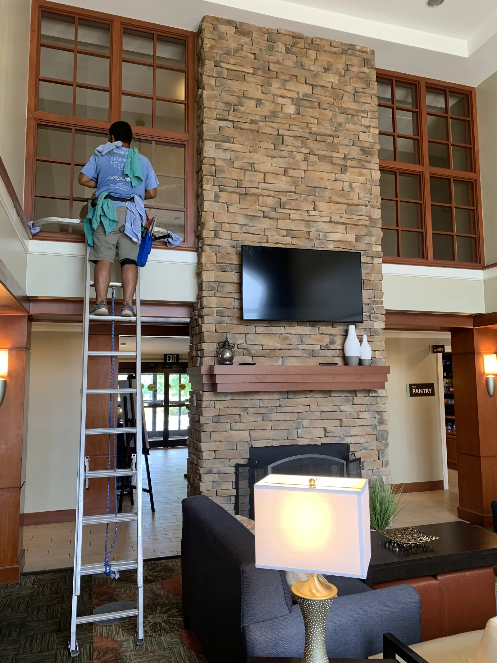 Hand-detailing interior residential window glass in Charlotte