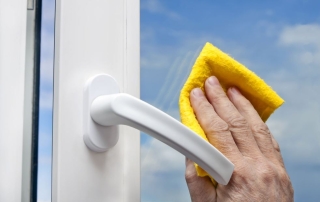 Cleaning a window with a cloth