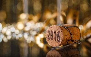 Cork with 2016 lying on decorated table