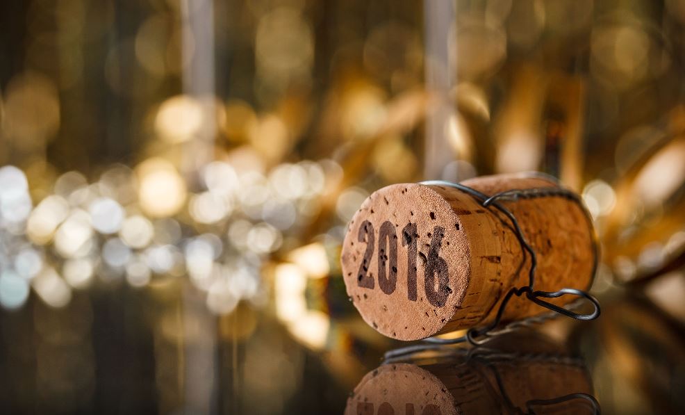 Cork with 2016 lying on decorated table