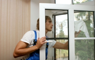 Pro worker cleaning windows