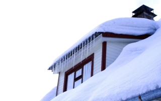 Rooftop and Gutters Covered in Snow