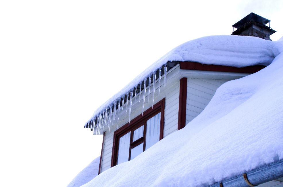 Rooftop and Gutters Covered in Snow