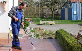 Man doing professional power washing services